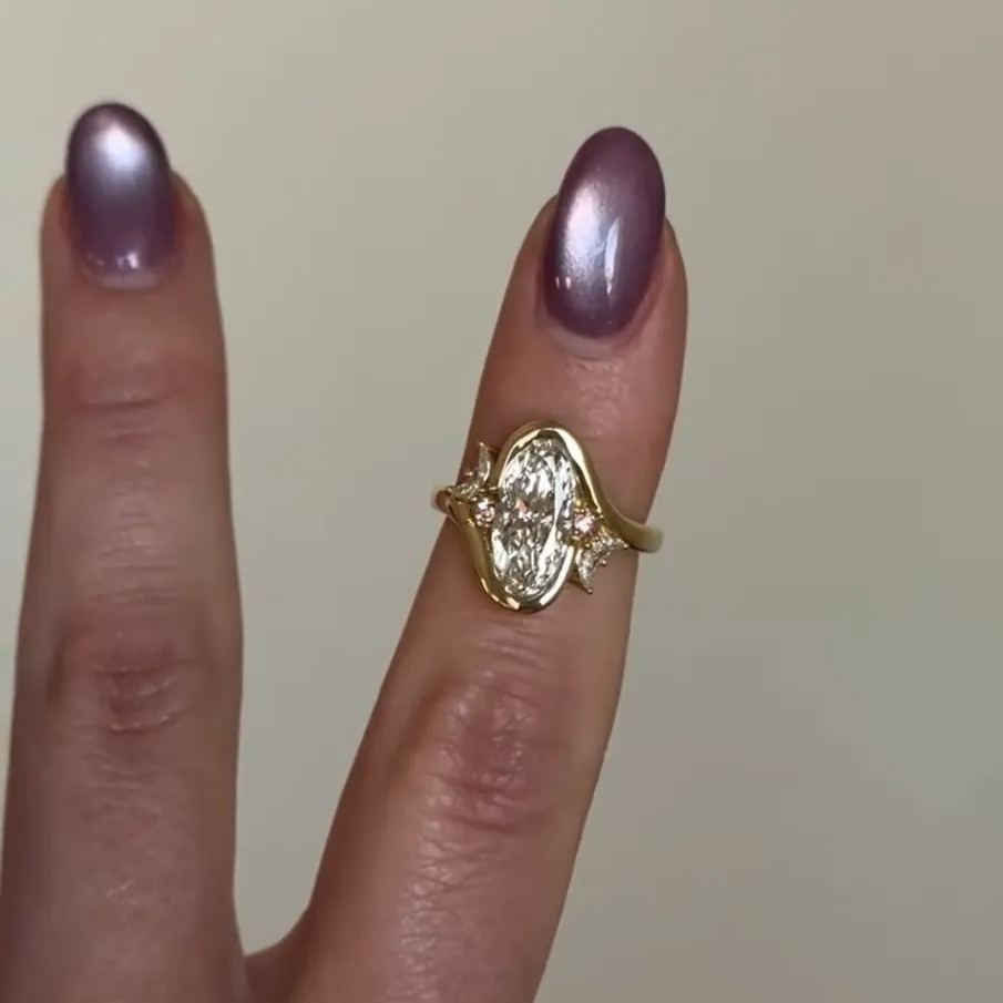 Asymmetric Moon: Oval Cut Engagement Ring