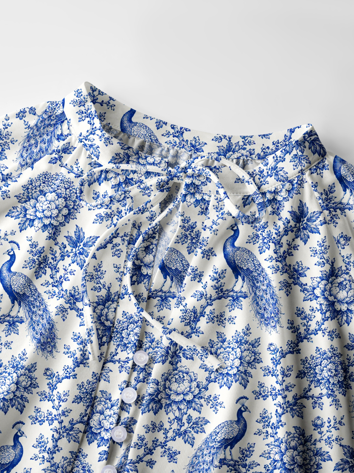 Blue Chinoiserie Peacock and Bloom Toile Print Boho Long Sleeve Tie‑Neck Blouse