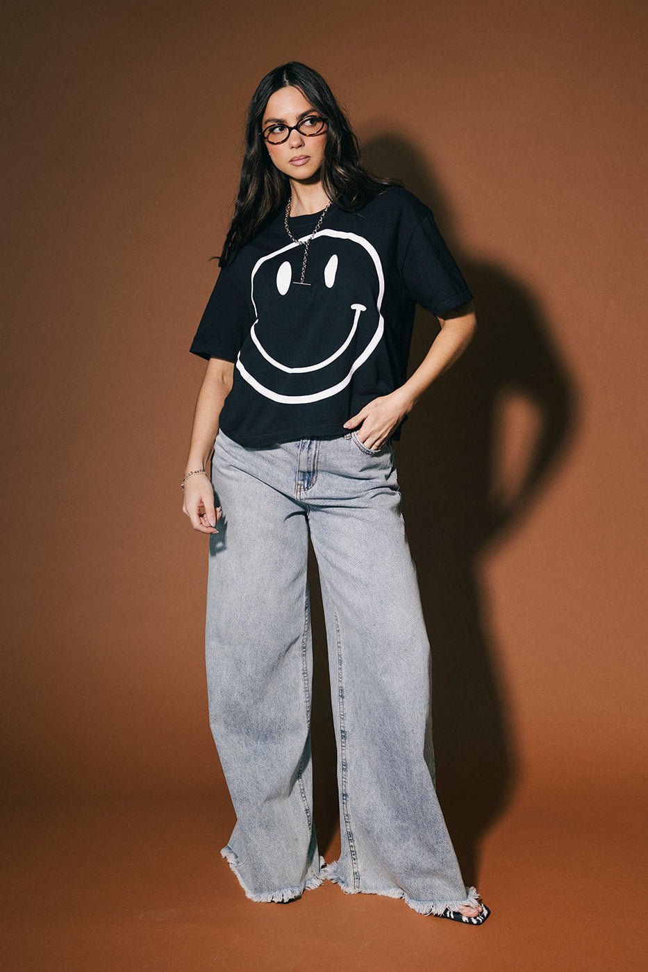 The World Needs Your Magic Crop Tee in Black