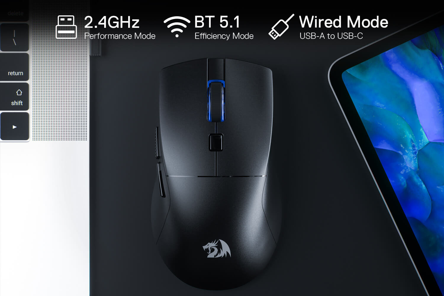 Black gaming mouse with connectivity options on a desk