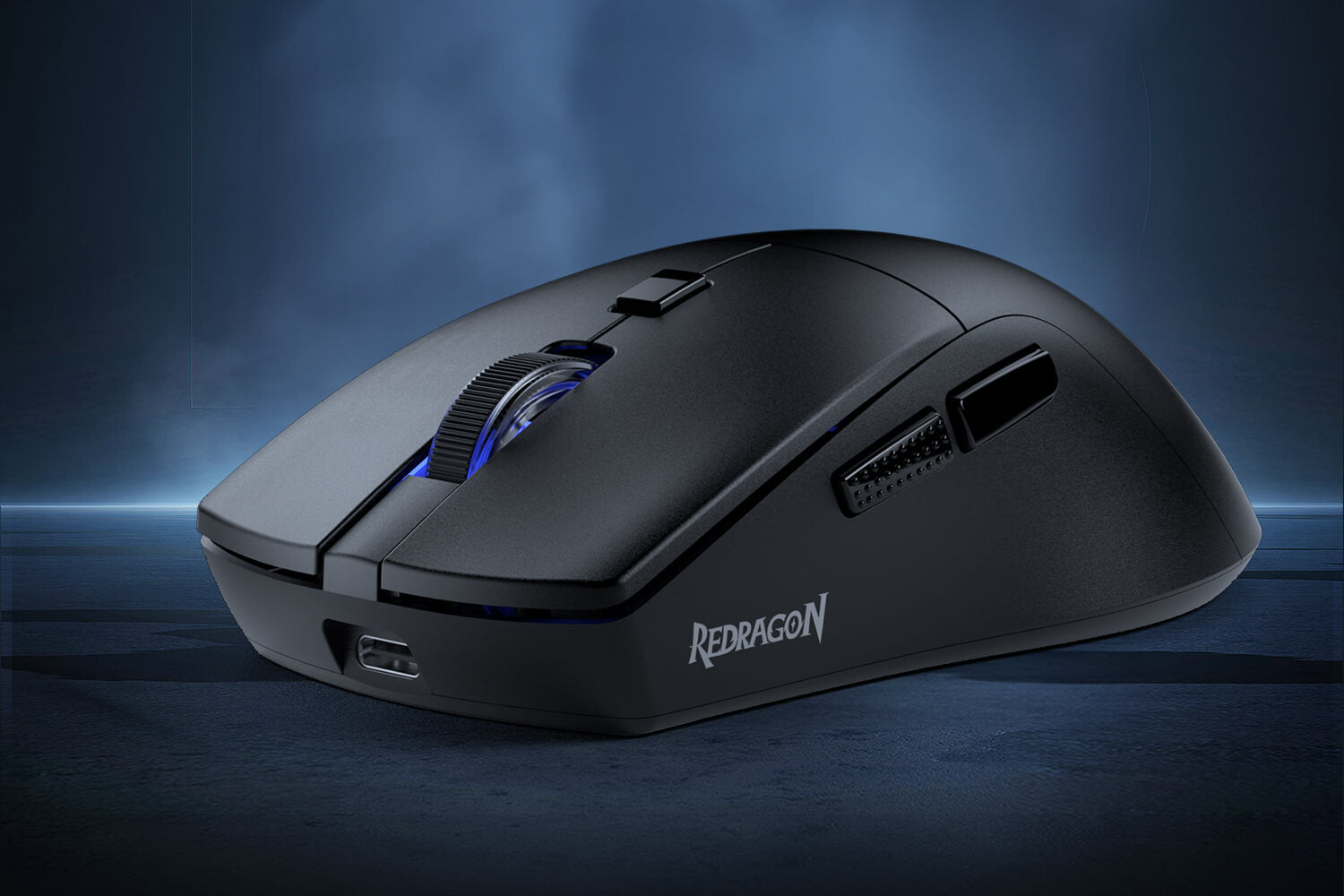 Black gaming mouse with Redragon logo on a dark background
