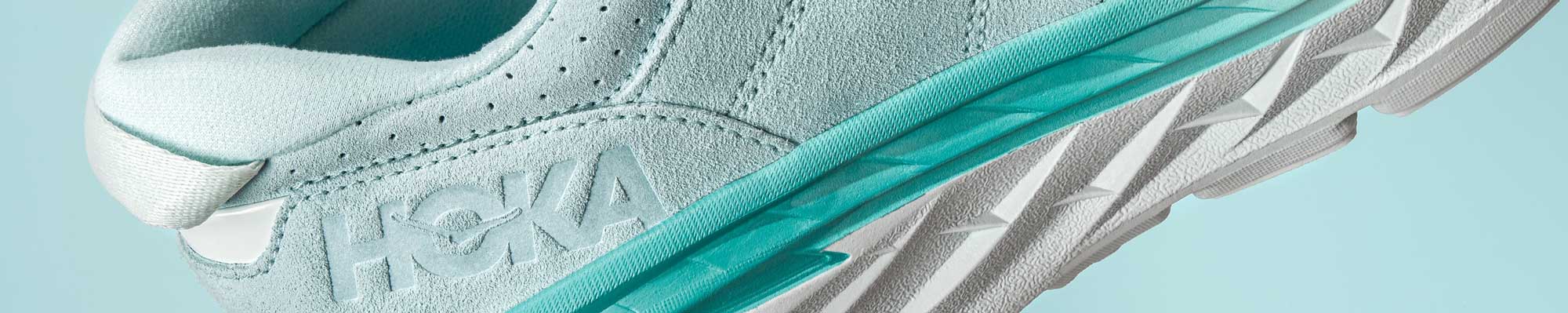 Side view HOKA shoes.