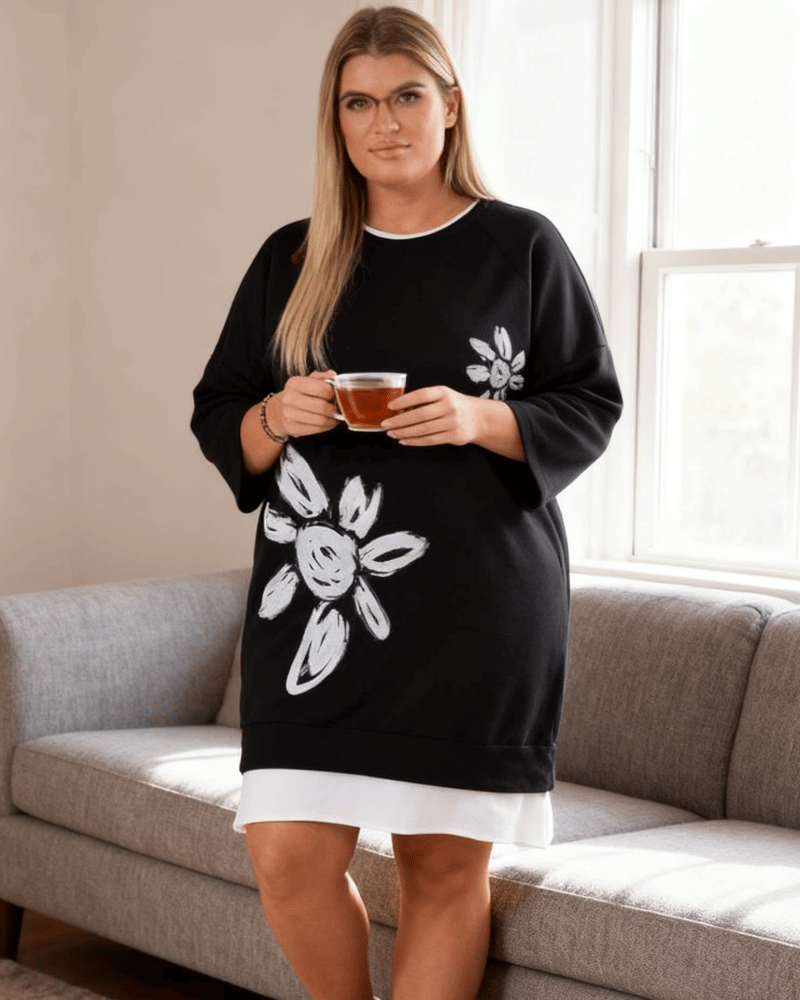 Emma wearing the sweatshirt dress