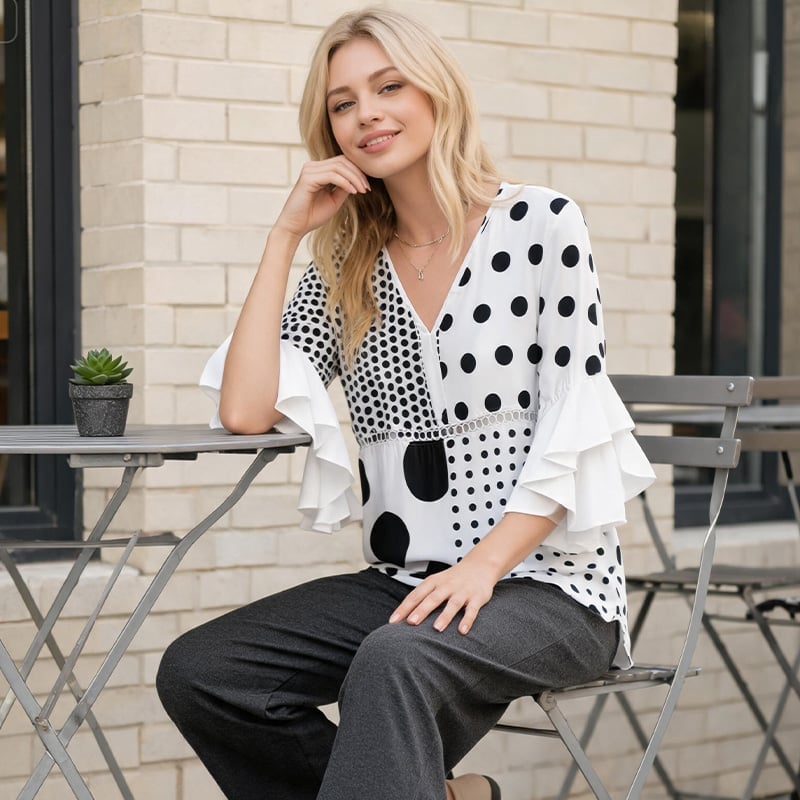 Emily wearing the ruffle blouse