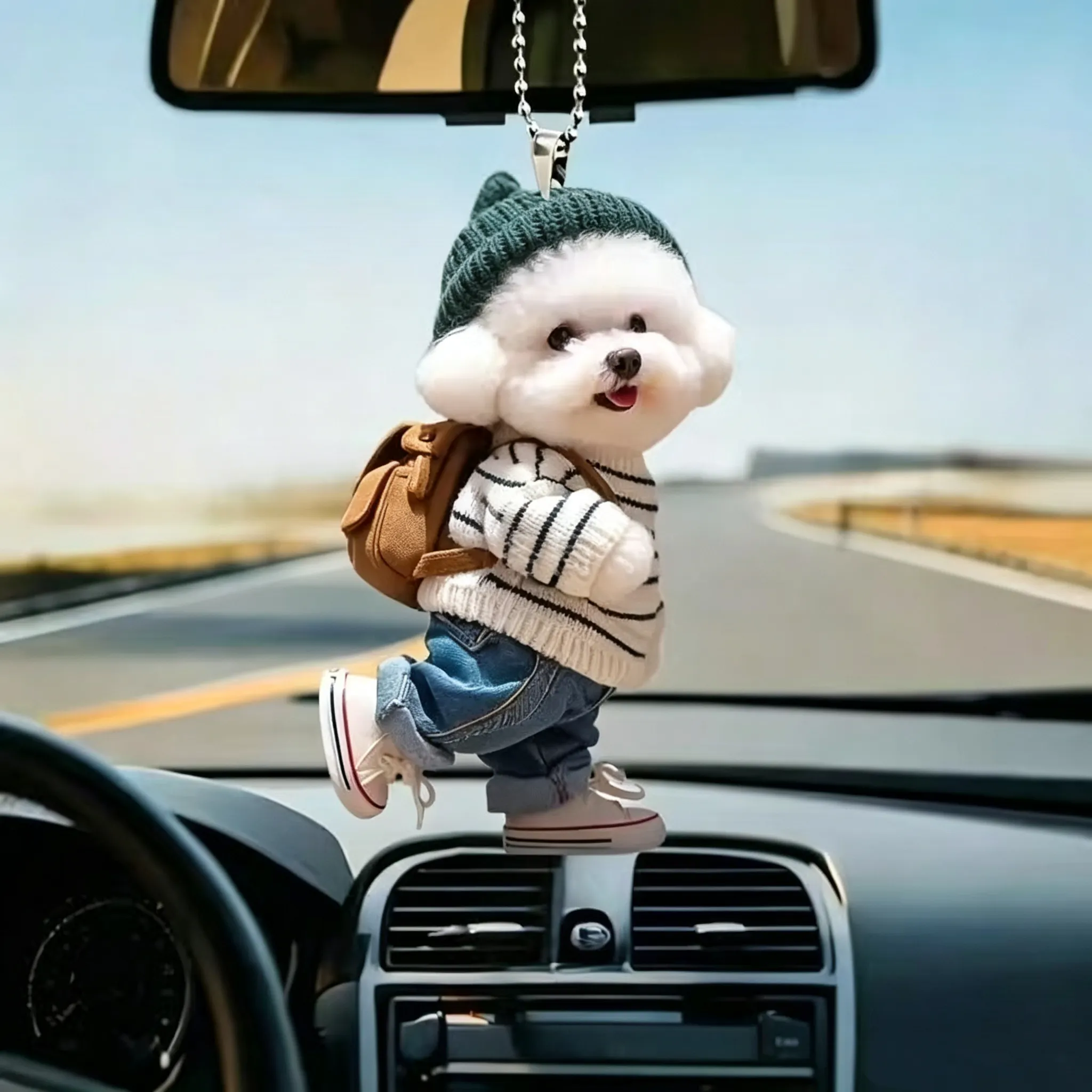Puppy outfit 3D keychain hanging in a car