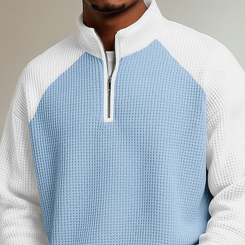Close front view showing the waffle texture and contrast raglan shoulders