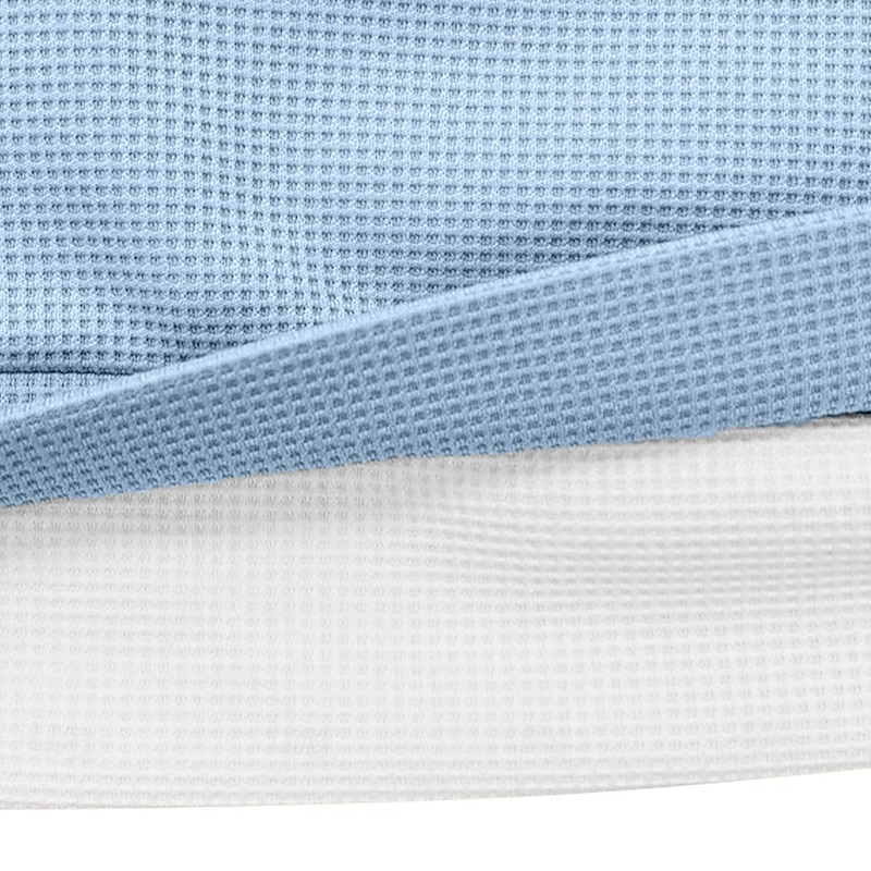 Close-up of blue and white waffle-knit fabric texture