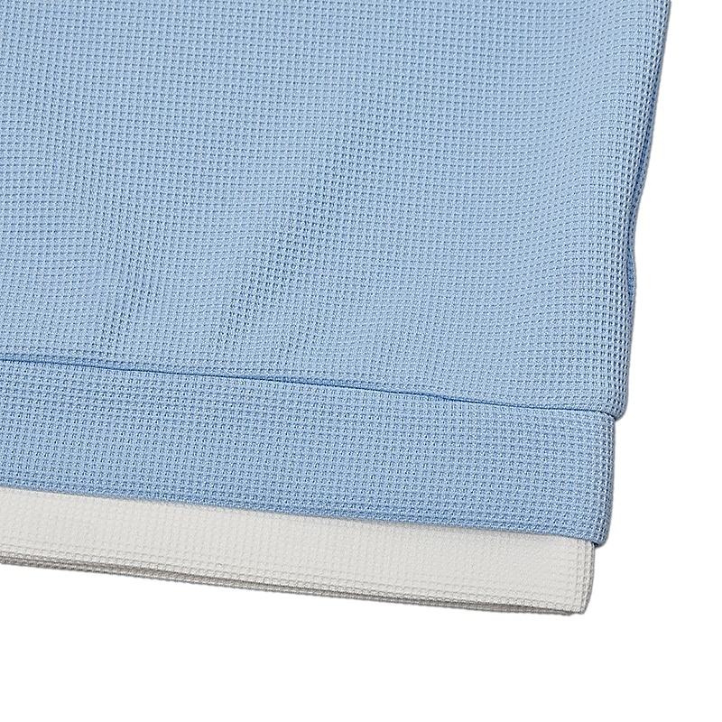Side seam and layered hem close-up
