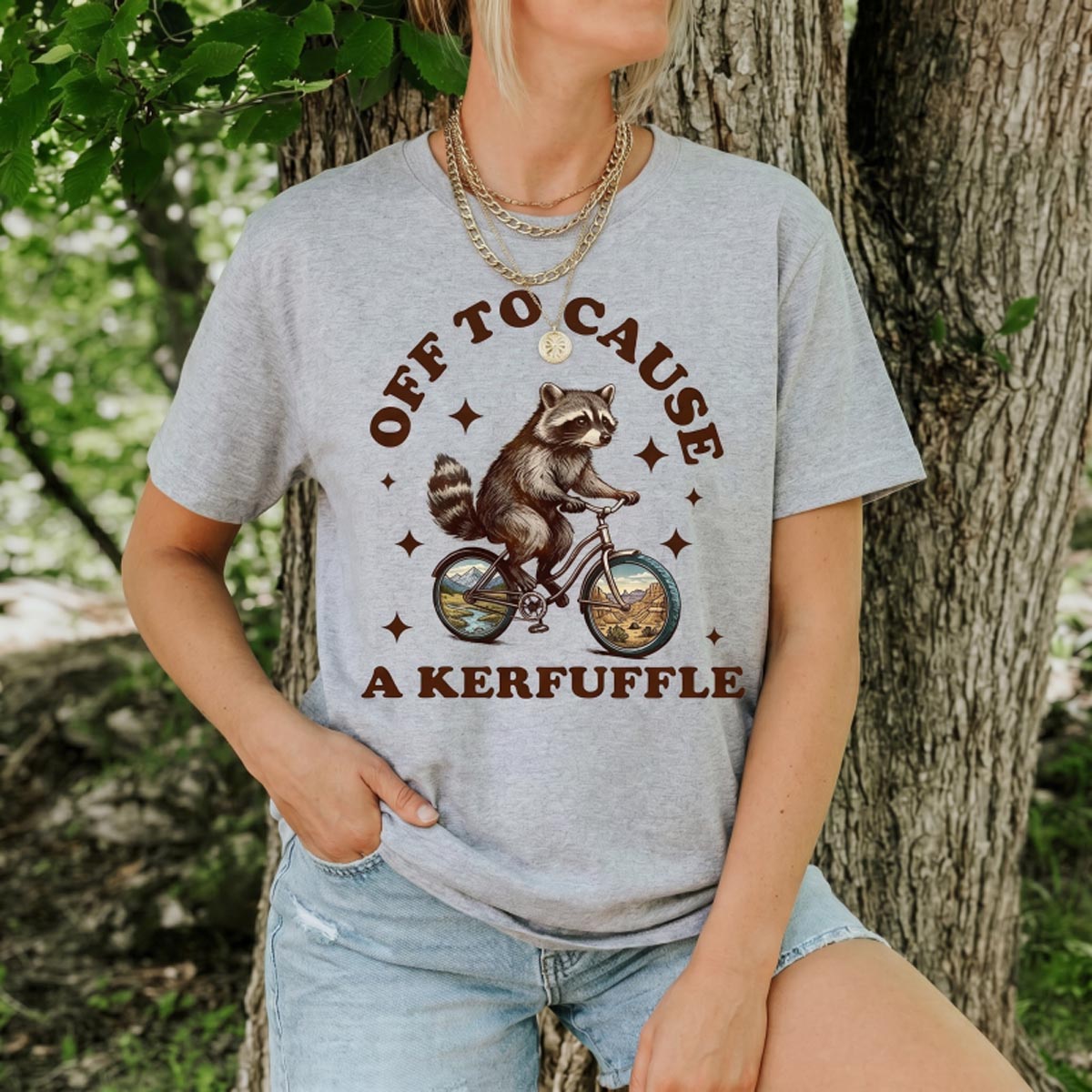 Off To Cause a Kerfuffle Raccoon T‑Shirt
