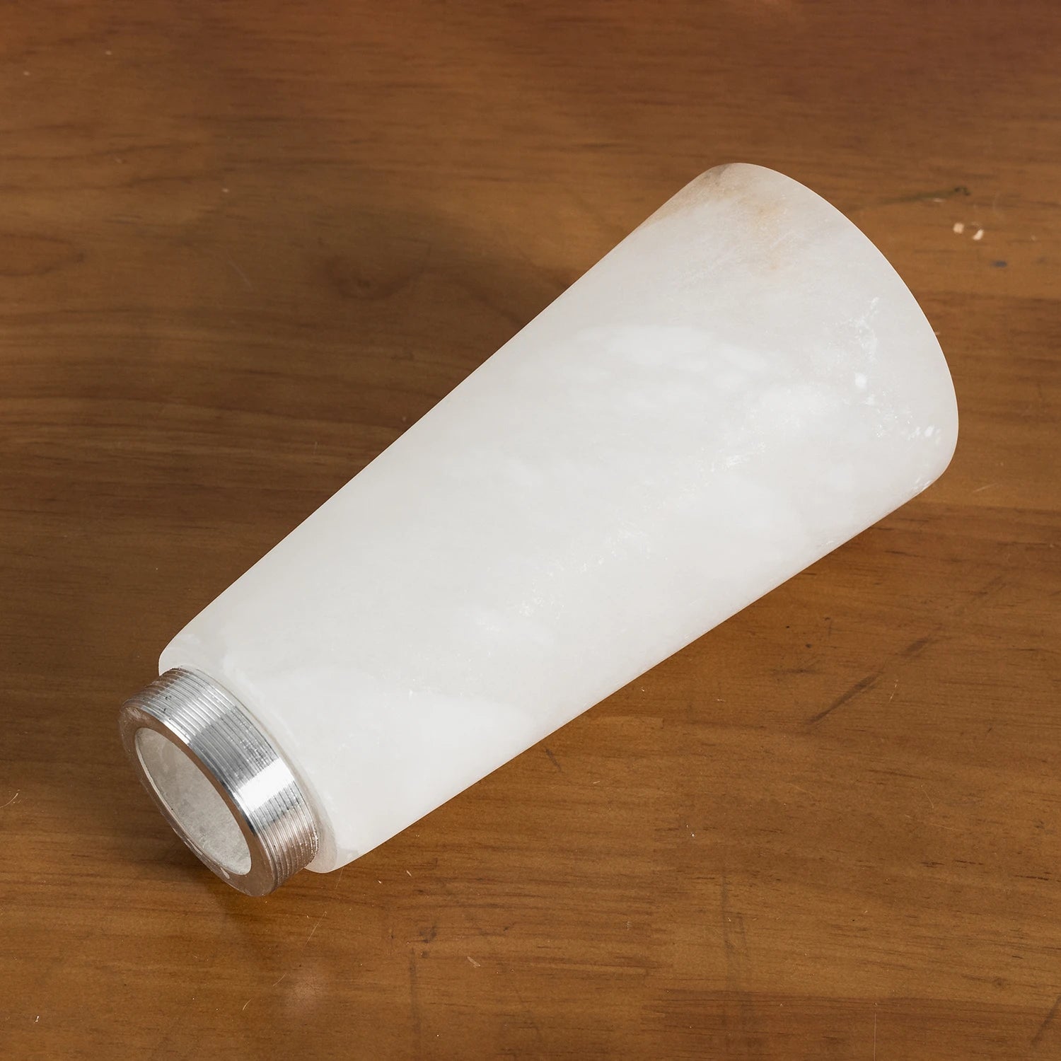 Hand-grinding and polishing the natural alabaster stone