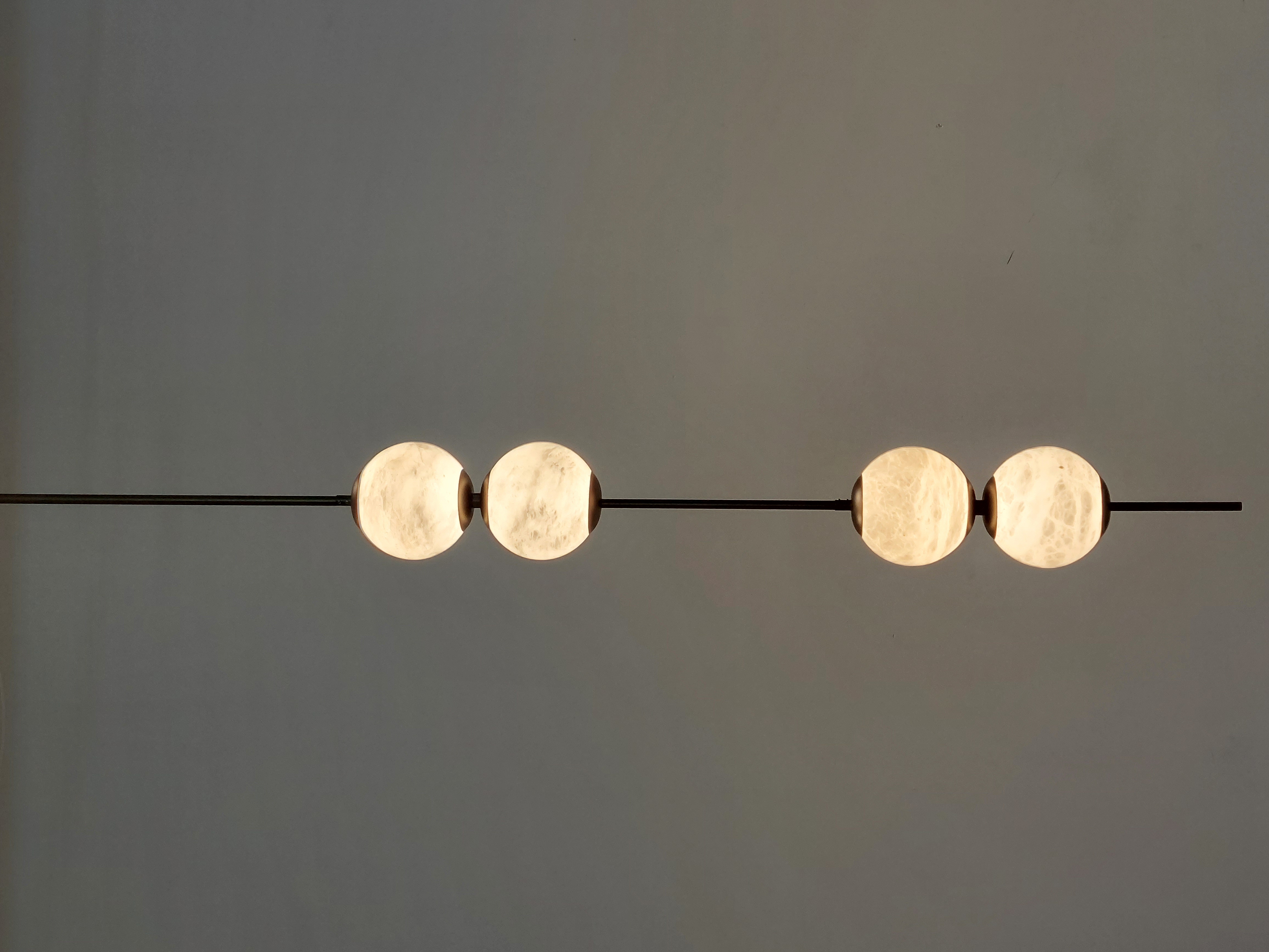 Casailighting Vertical 4-Globe Alabaster & Brass Pendant Light