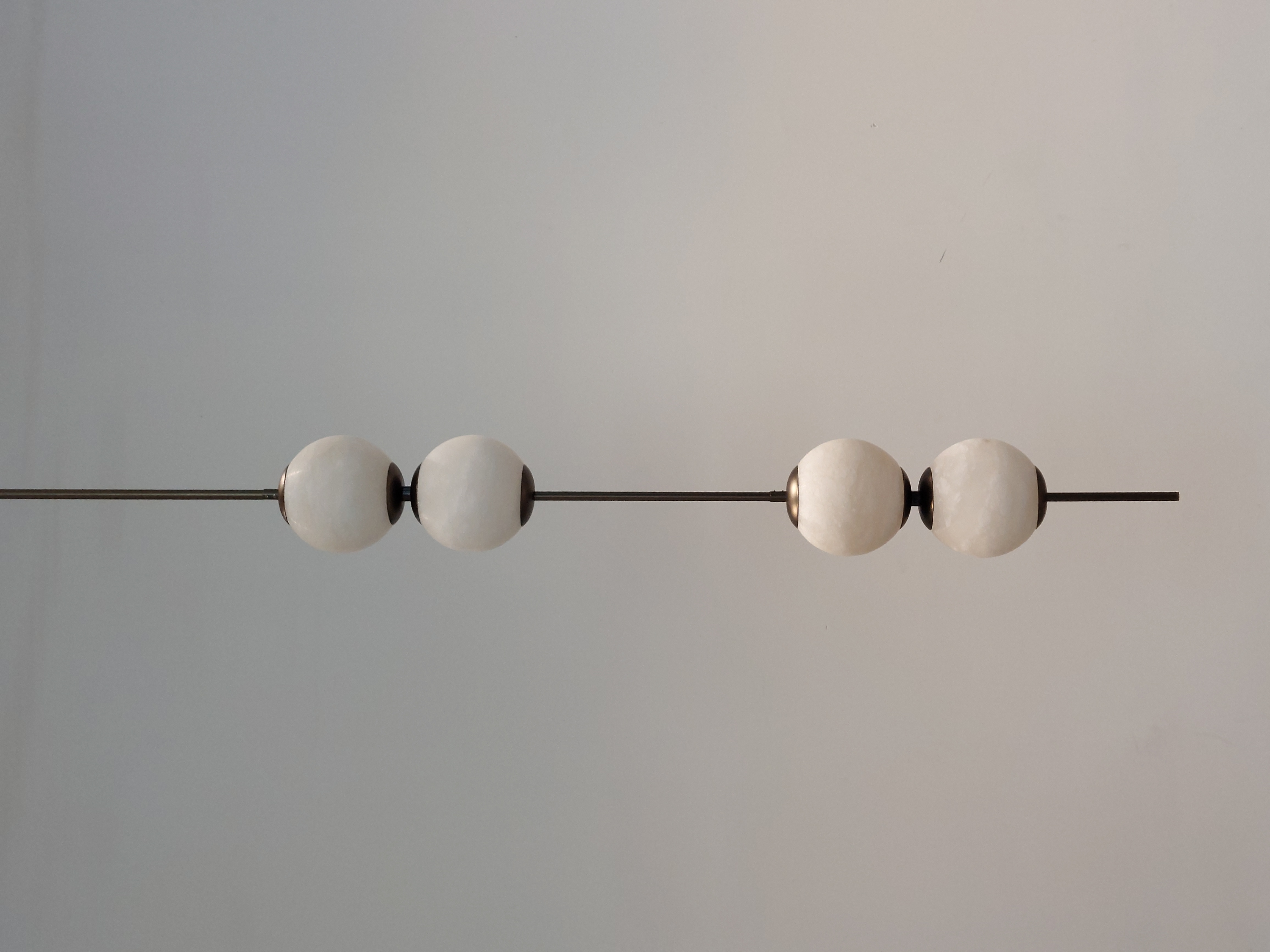 Casailighting Vertical 4-Globe Alabaster & Brass Pendant Light