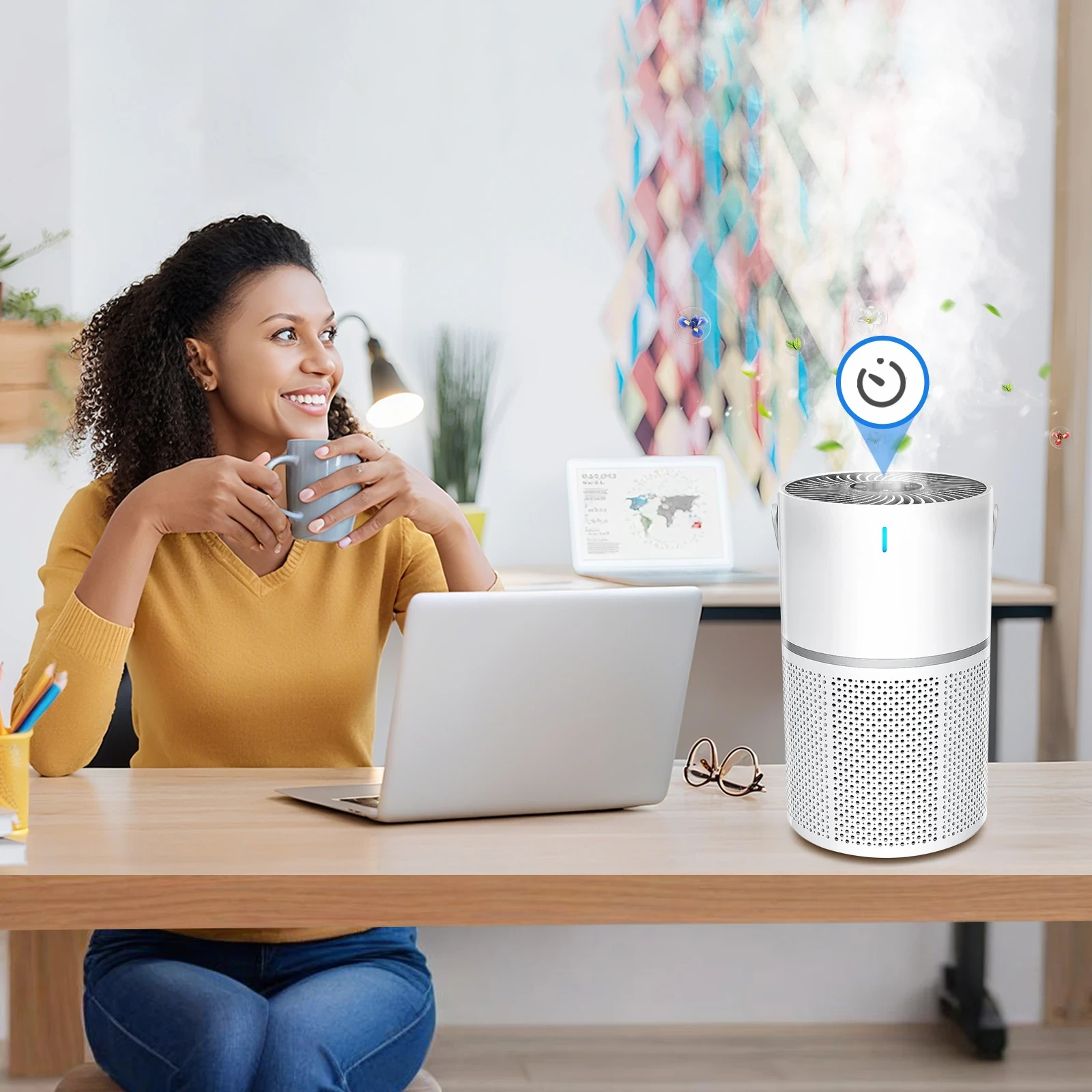 White cylindrical HEPA air purifier with perforated lower half and blue indicator light on wooden desk in home office setting