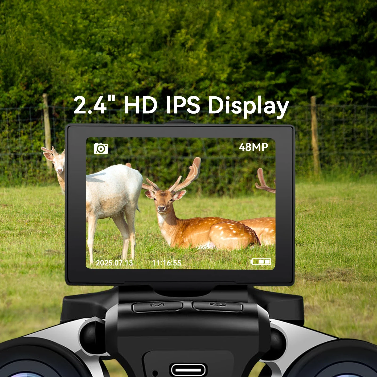Trail camera with 2.4-inch HD IPS display showing deer photo, 48MP resolution, timestamp, and battery indicator in grassy fie