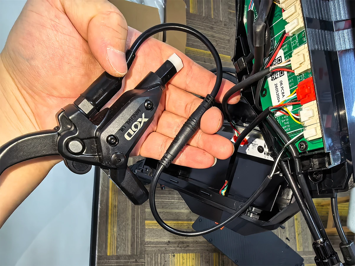 XOD brake sensor connected to KuKirin G2 2026 with dedicated adapter cable