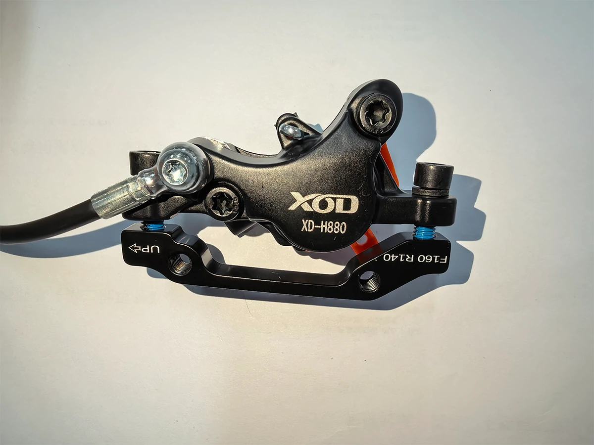 XOD H880 hydraulic brake caliper close-up for electric scooter hydraulic brake upgrade
