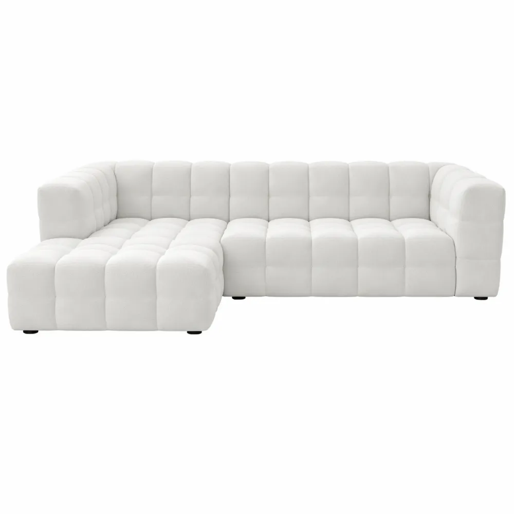 Divano ad angolo sinistro in tessuto bouclé color avorio