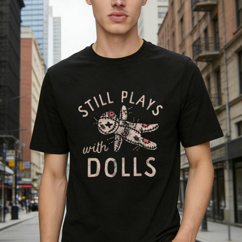Still Plays With Dolls Voodoo Graphic T-shirt