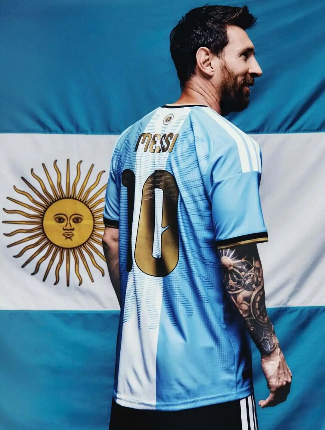 Messi wearing the Argentina special edition 2026 shirt, back view with the gold number 10