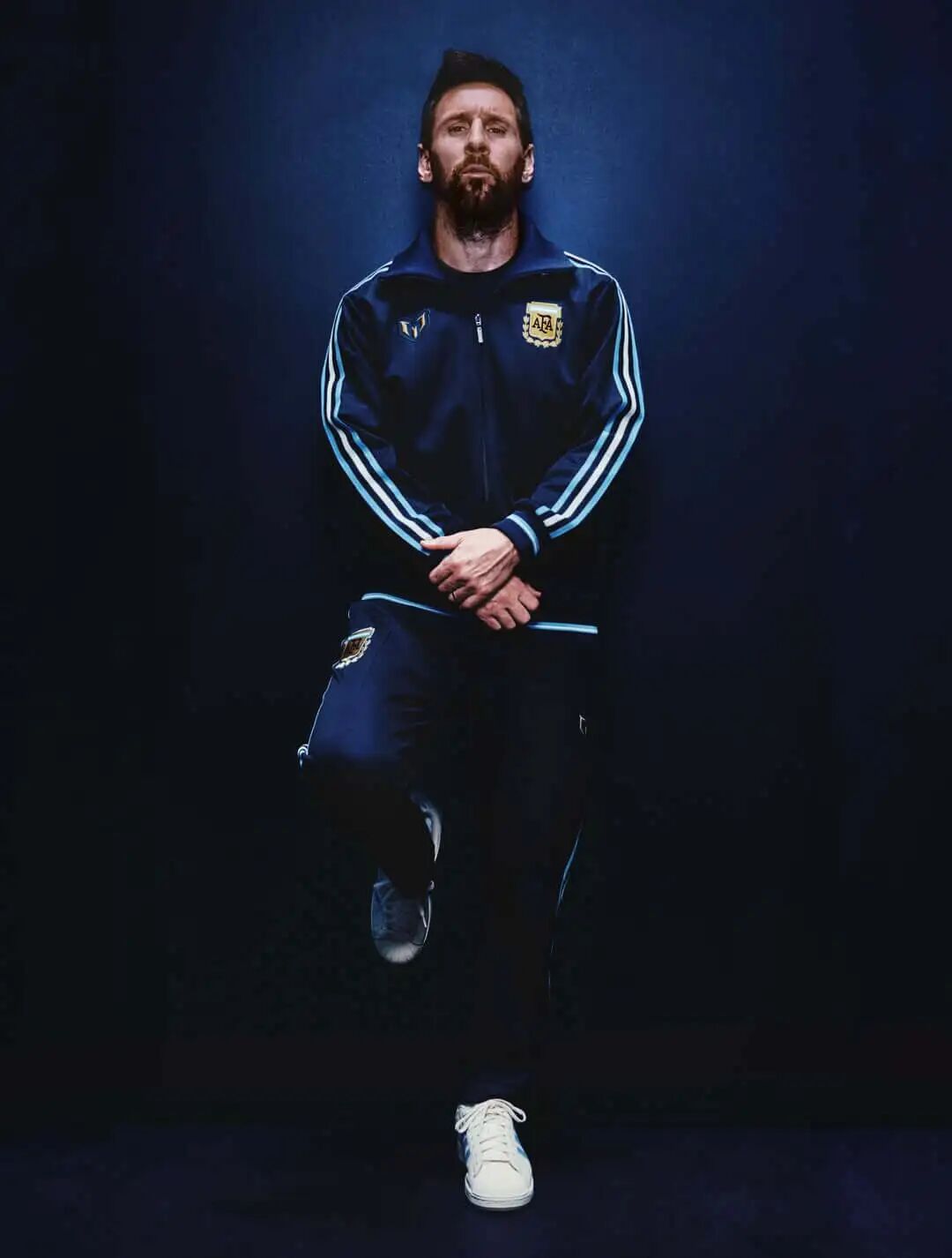 Messi standing in the Argentina Messi 2026 night navy track jacket