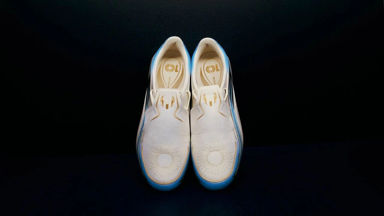 F50 Messi Elite firm ground football boots in white, pair