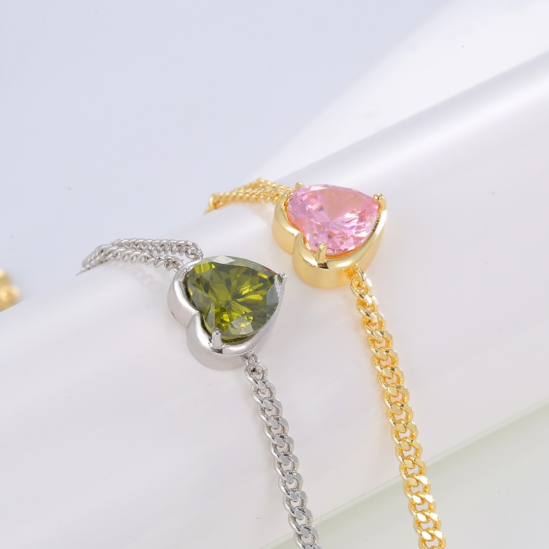Elegant Gold-Tone Heart Pendant Bracelet with Pink Crystal Accent