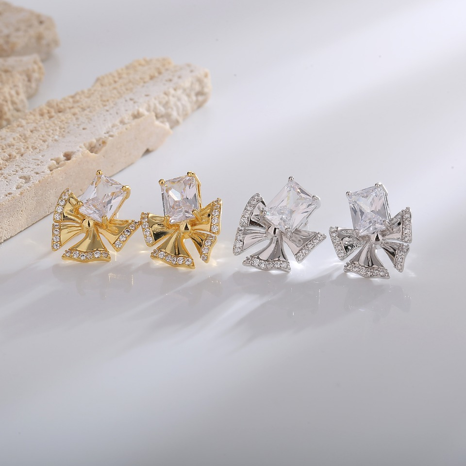 Golden Bow - Shaped Stud Earrings with Emerald - Cut Gemstone and Pavé Diamonds
