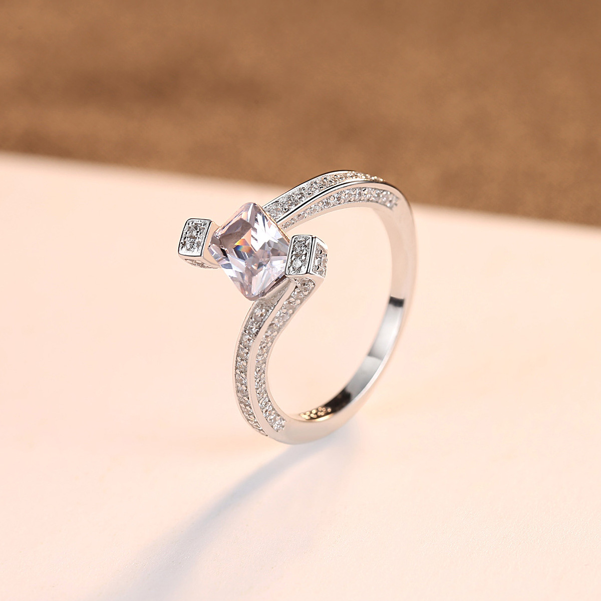 Emerald Cut Cubic Zirconia Halo Split Shank Ring in Sterling Silver
