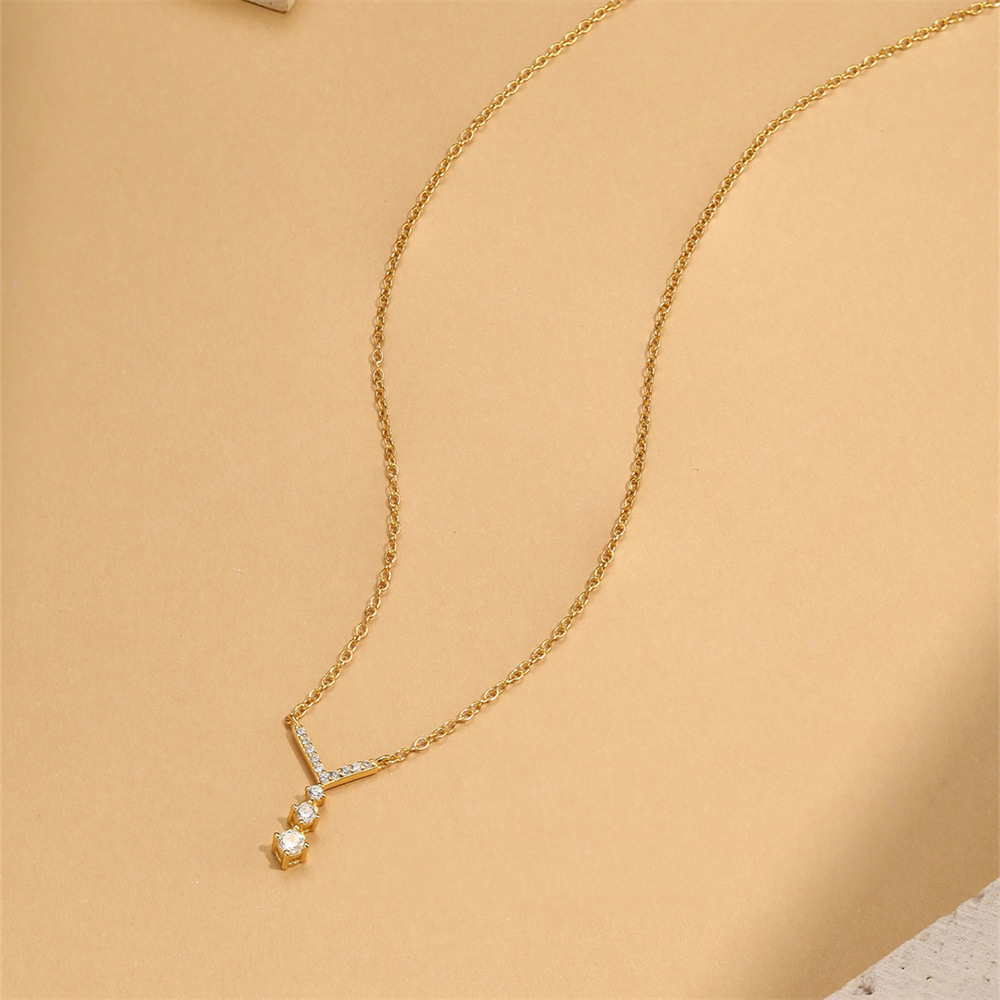 Elegant Gold-Tone V-Shaped Y-Necklace with Dangling Cubic Zirconia 