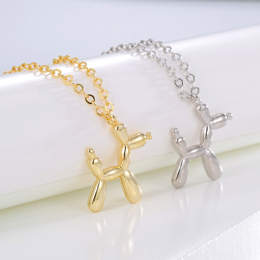 Gold-Tone Balloon Dog Pendant Necklace