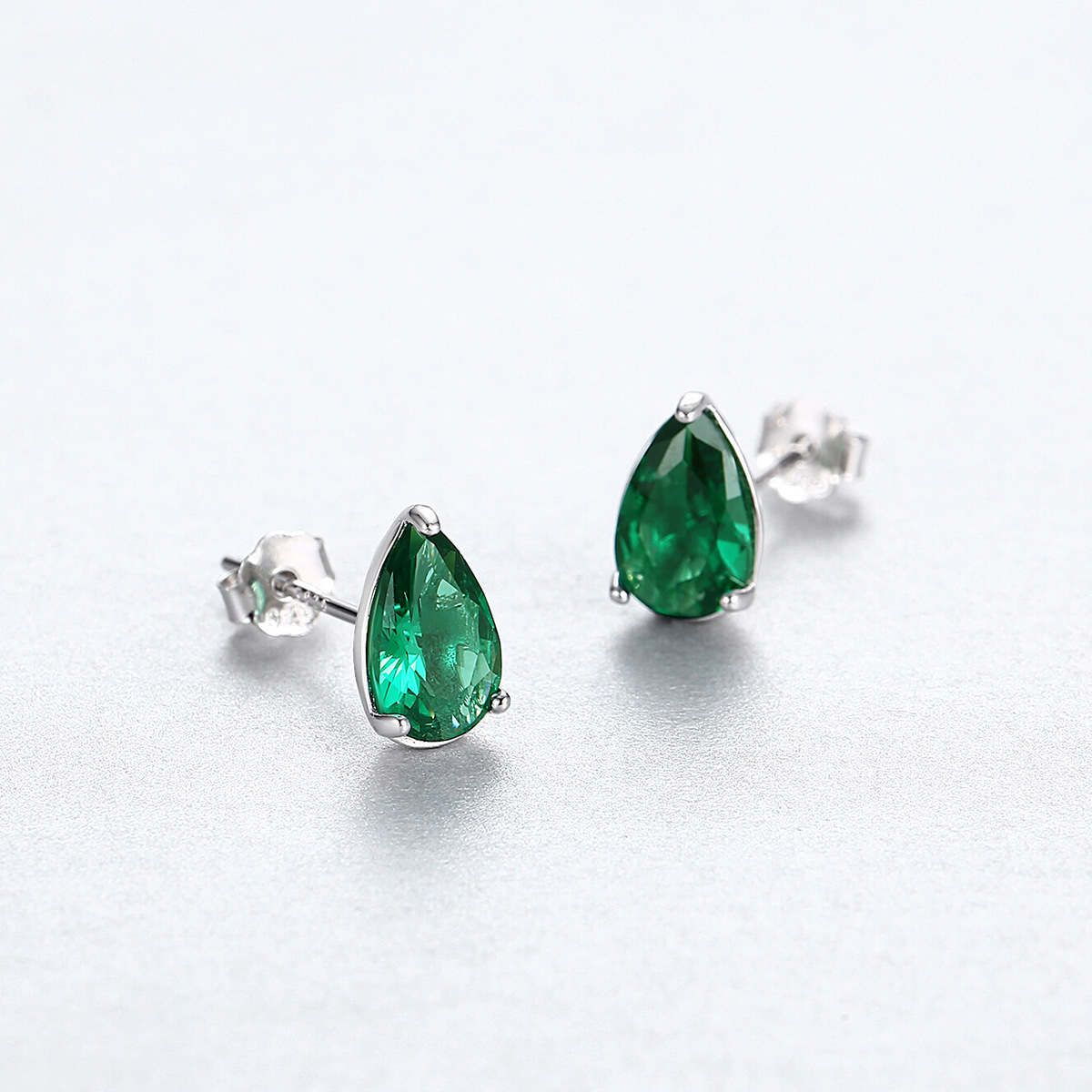 Classic Emerald Teardrop Stud Earrings with Simple Bezel Setting in Silver Tone
