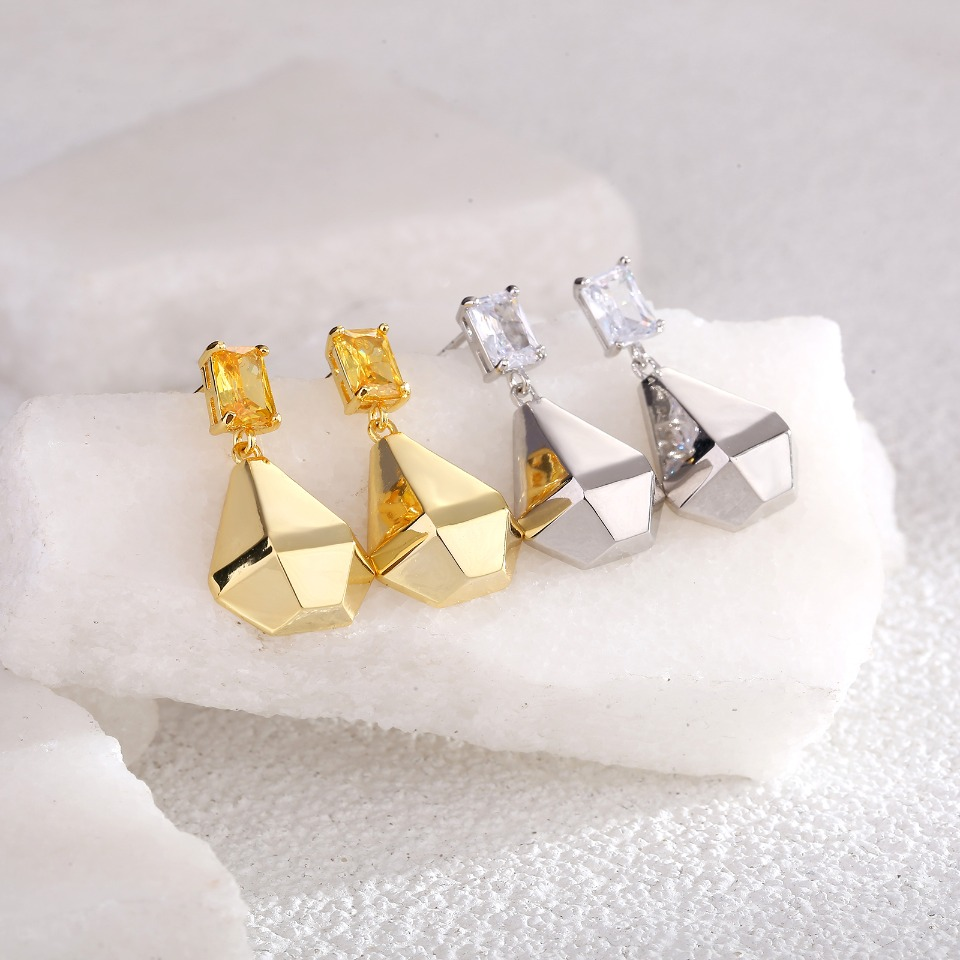 Gold - Toned Drop Earrings with Emerald - Cut Yellow Gemstone and Geometric Faceted Pendant