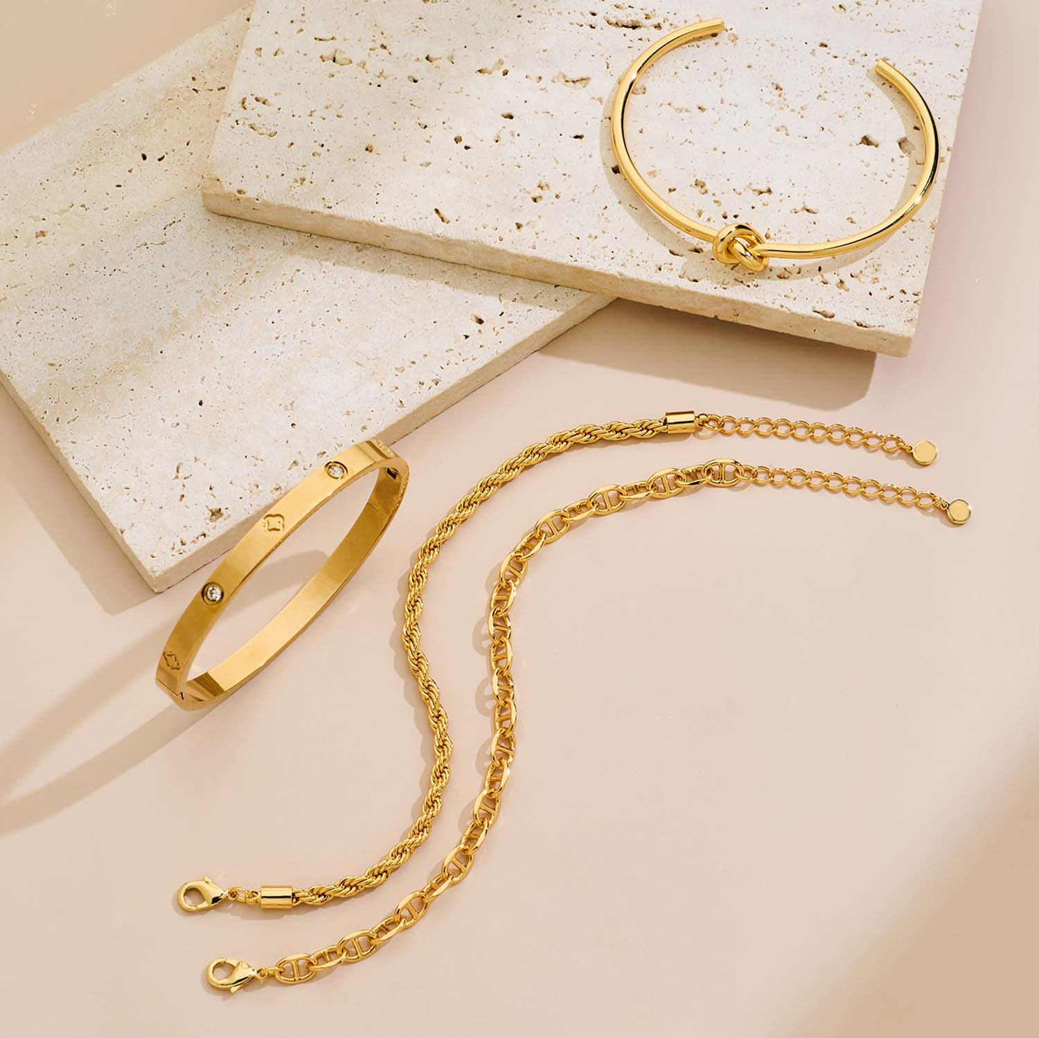 4-Piece Gold Plated Copper Bangle Set - Mixed Styles: Love Knot, Diamond Accent, Braided & Paperclip Cuff Bracelets for Women