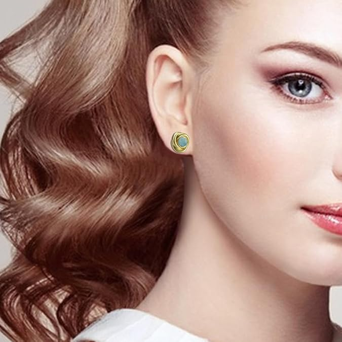 Elegant Gold Twisted Stud Earrings with Light Blue Cabochon Center