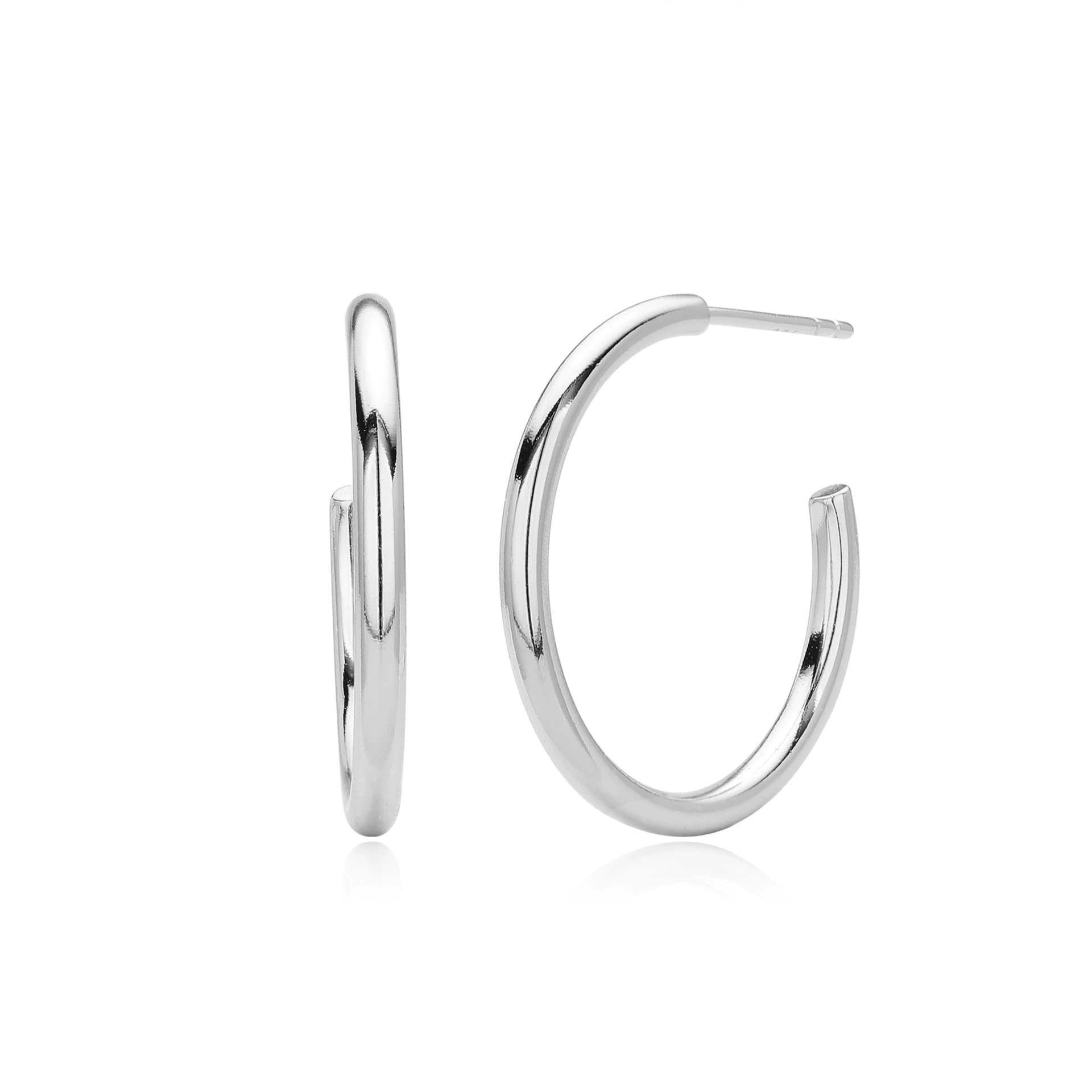 The small, secure-fitting hoop sits close to the ear, offering understated elegance and all-day comfort