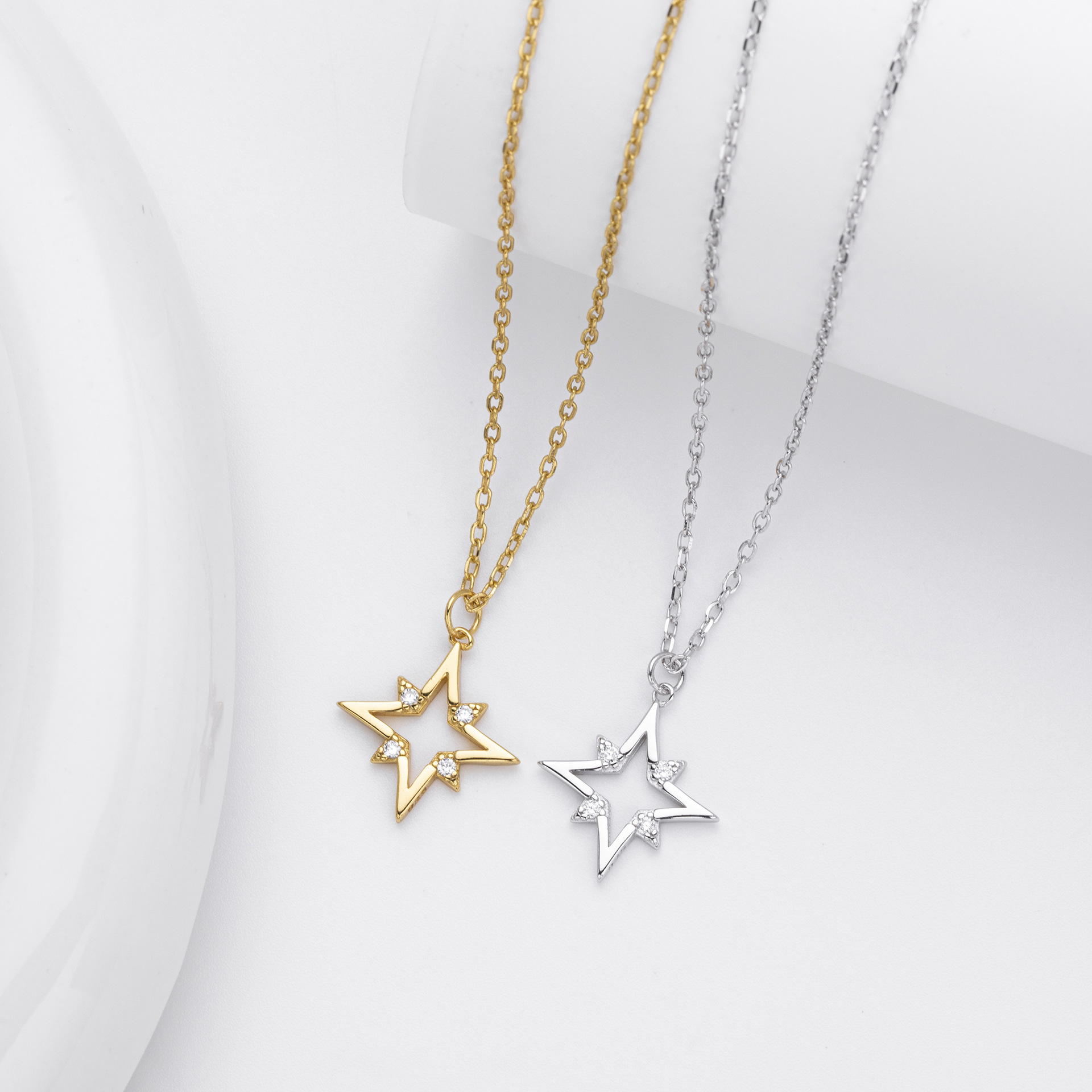 The Celestial Sparkle: Sterling Silver Star Necklace