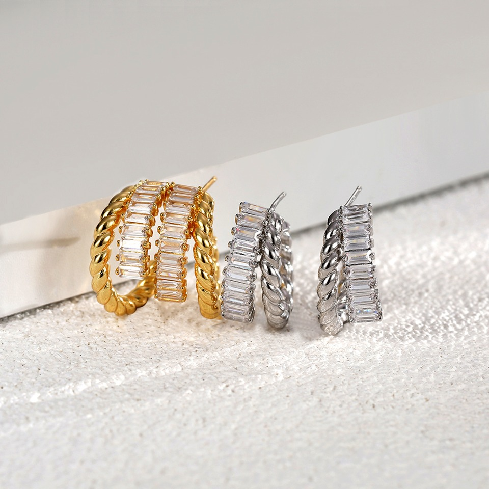 Gold - Plated Twisted Hoop Earrings with Baguette - Cut Crystal Inlay