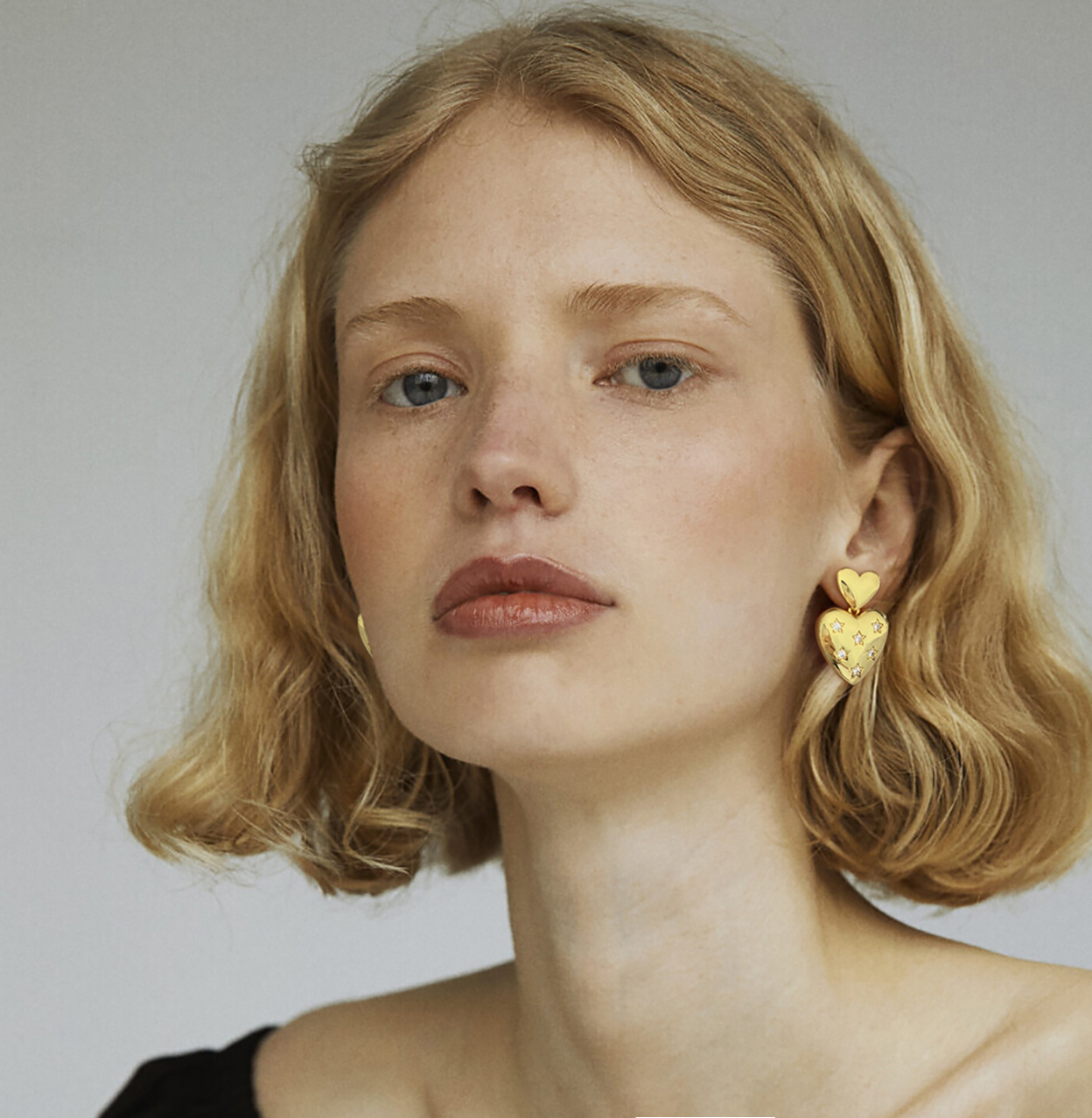 Gold Plated Copper Double Heart Drop Earrings with Star Accents
