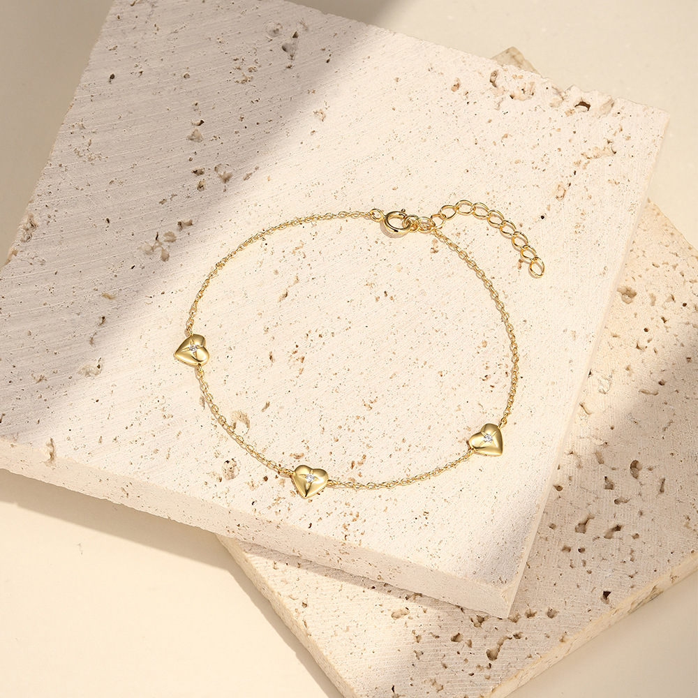 Gold Triple Heart Bracelet with Diamond