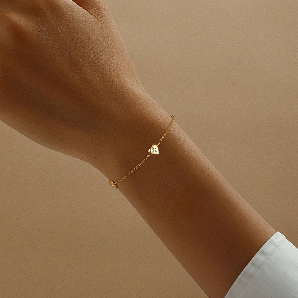 Gold Triple Heart Bracelet with Diamond