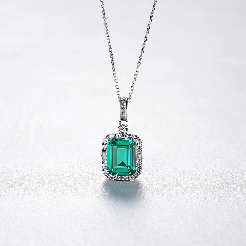 Sterling Silver Emerald Cut Green Pendant Necklace with Halo Design