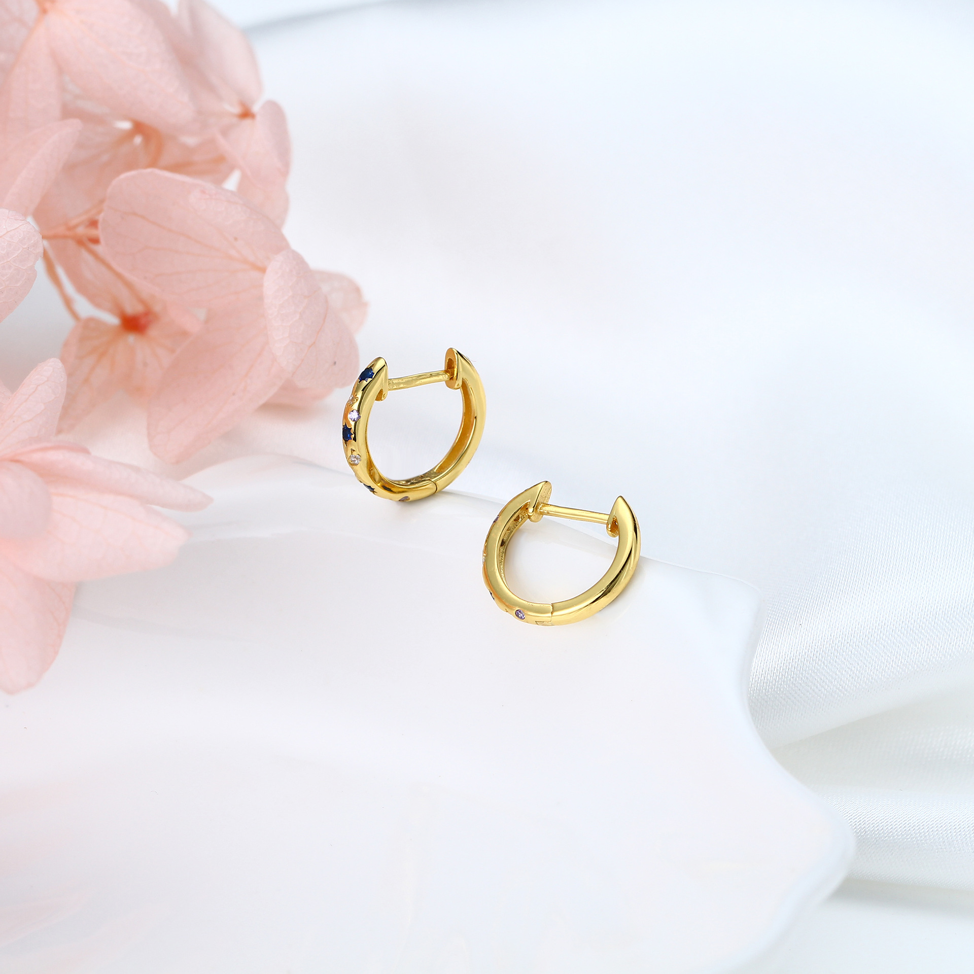 Elegant Silver Huggie Hoop Earrings with Sapphire