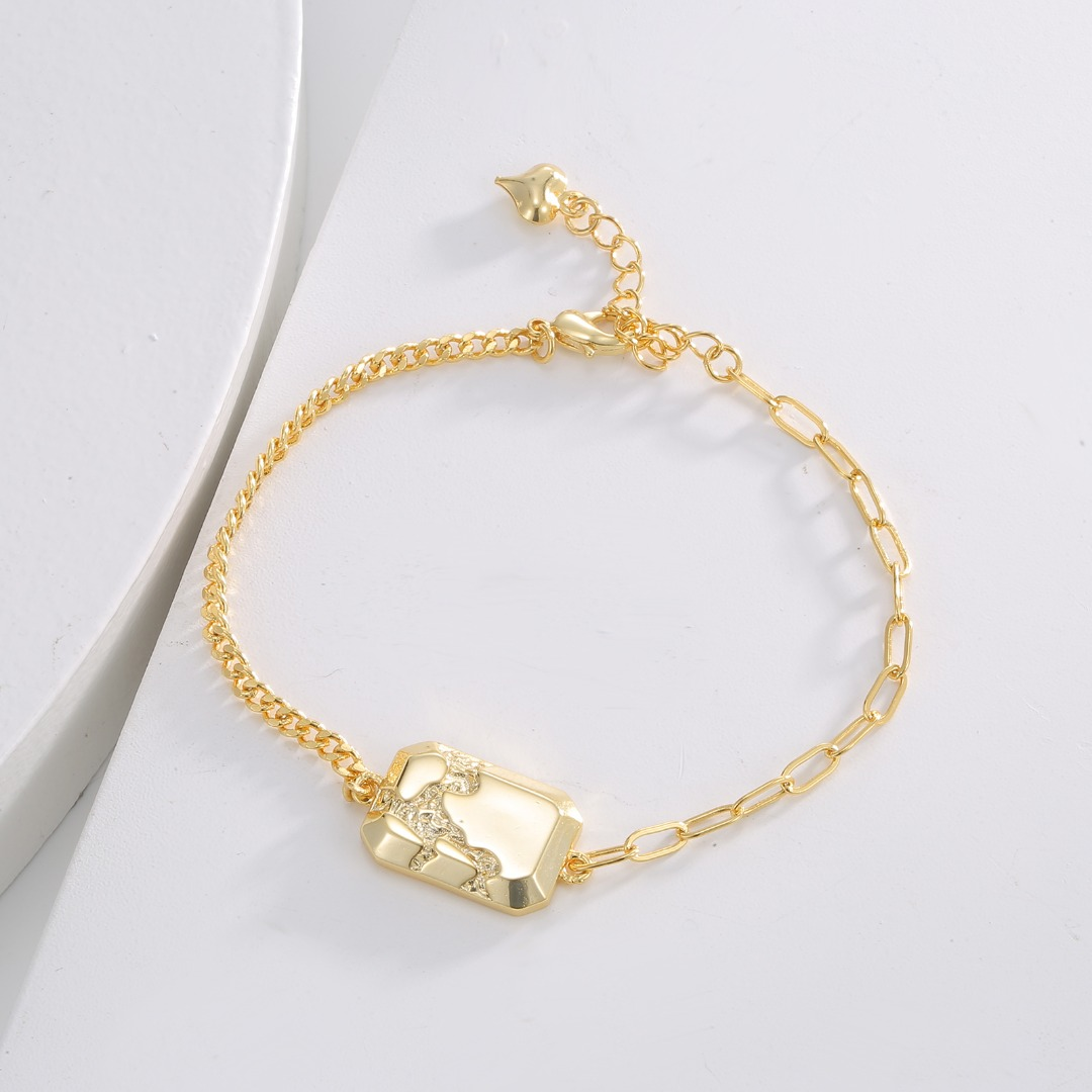 Gold-Tone Chain Bracelet with Geometric Octagonal Pendant Featuring a Textured Design