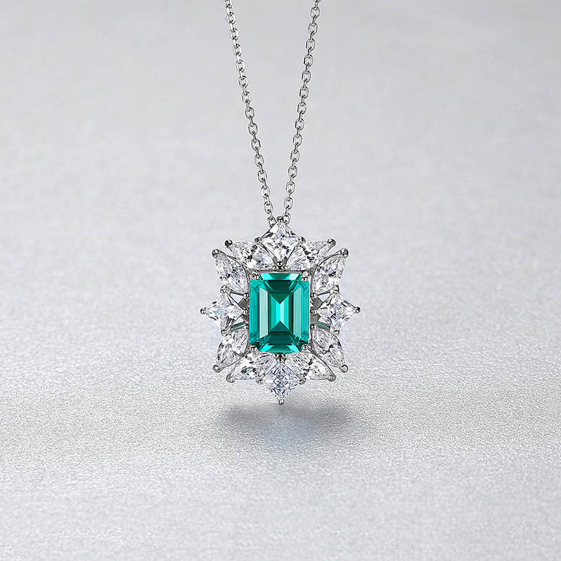 Sterling Silver Emerald Cut Turquoise Pendant Necklace with Marquise Cluster Halo