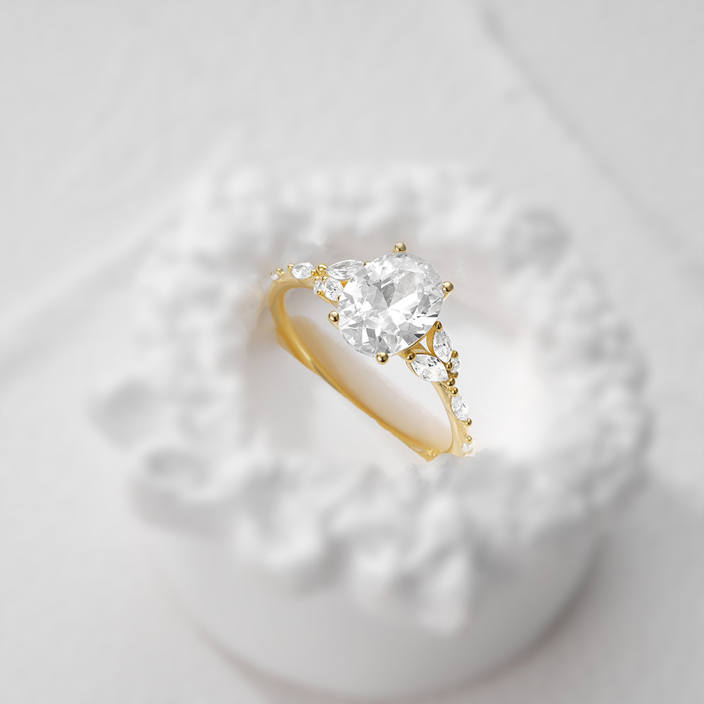 Elegant Oval Cut Engagement Ring with Marquise Diamond Accents in 18K Yellow Gold