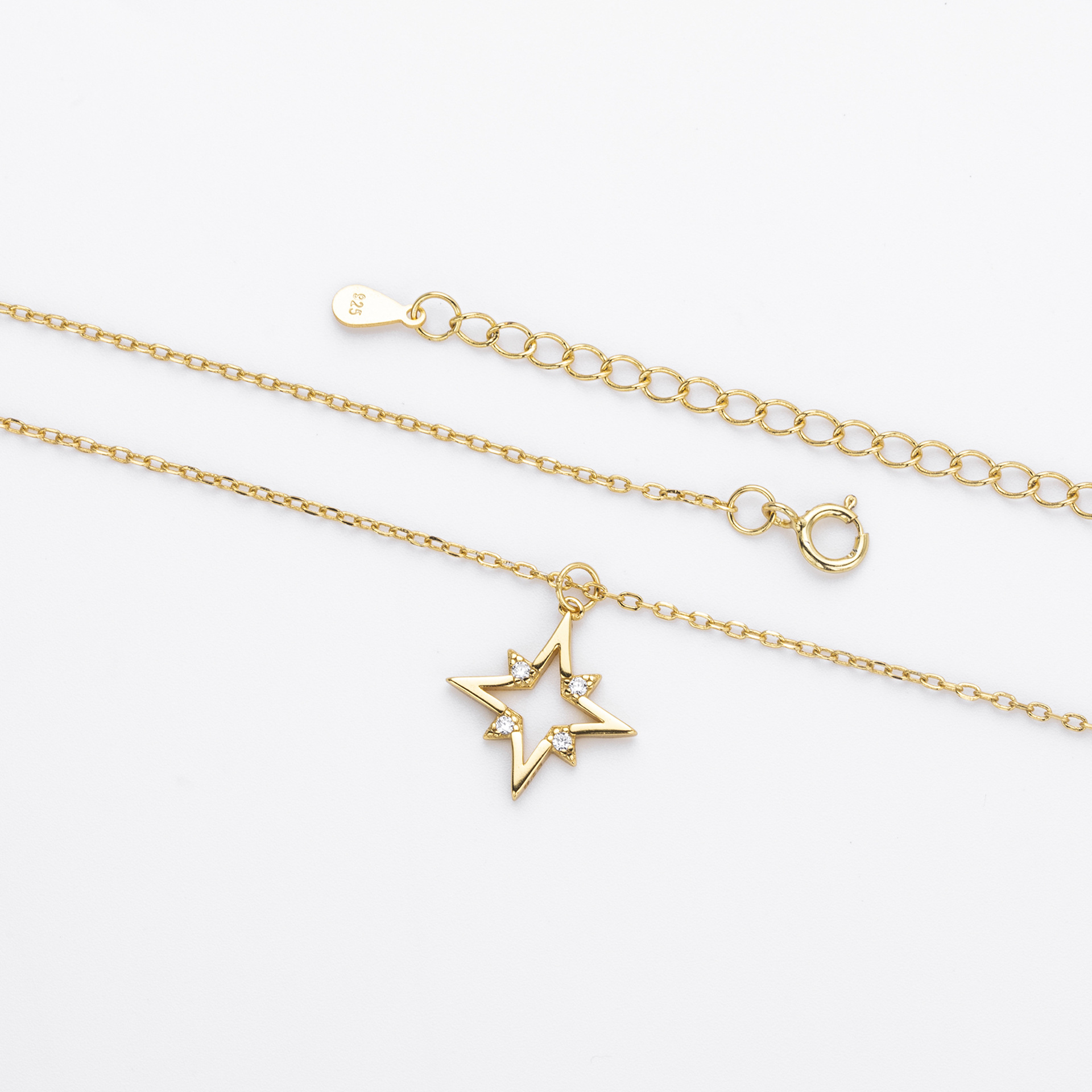 The Celestial Sparkle: Sterling Silver Star Necklace