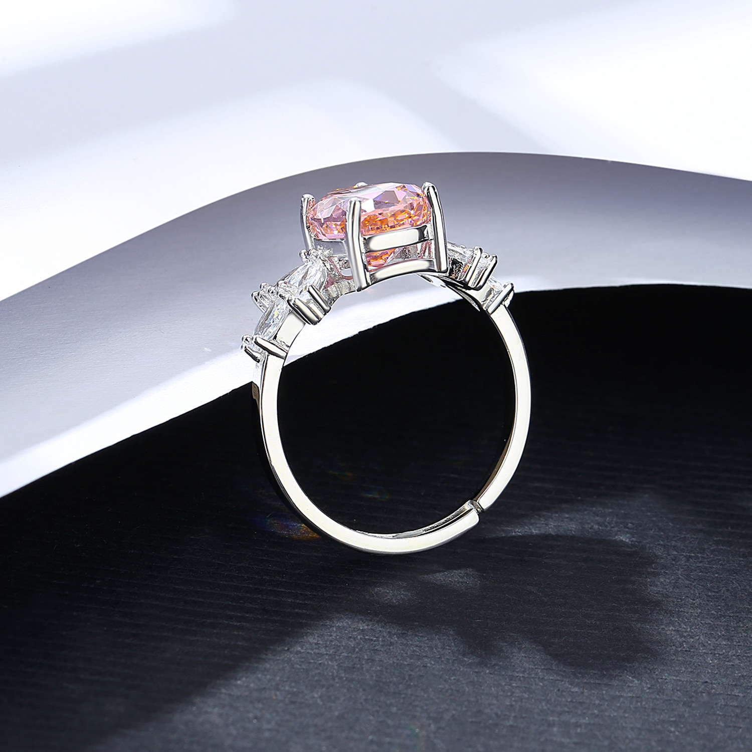 Elegant Pink Teardrop Cubic Zirconia Ring with Marquise Side Stones