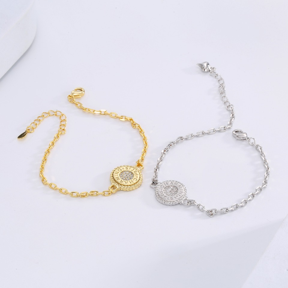 Coin Pendant Bracelet Inlaid with Cubic Zirconia
