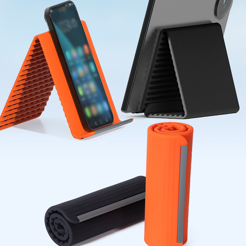 🥳2026 HOT SALE🥳💞50K+ SOLD!🛋️✨ 50% OFF! Silicone Foldable Stand – Shape it your way, reduces neck pain. Ultra‑portable, anti‑slip. Work, cook or watch hands‑free. A small stand, big relief.📱🛡️
