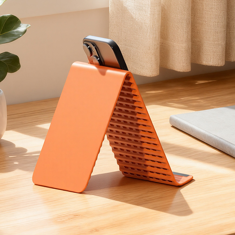 🥳2026 HOT SALE🥳💞50K+ SOLD!🛋️✨ 50% OFF! Silicone Foldable Stand – Shape it your way, reduces neck pain. Ultra‑portable, anti‑slip. Work, cook or watch hands‑free. A small stand, big relief.📱🛡️